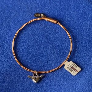Guitar sting bracelet with heart charm